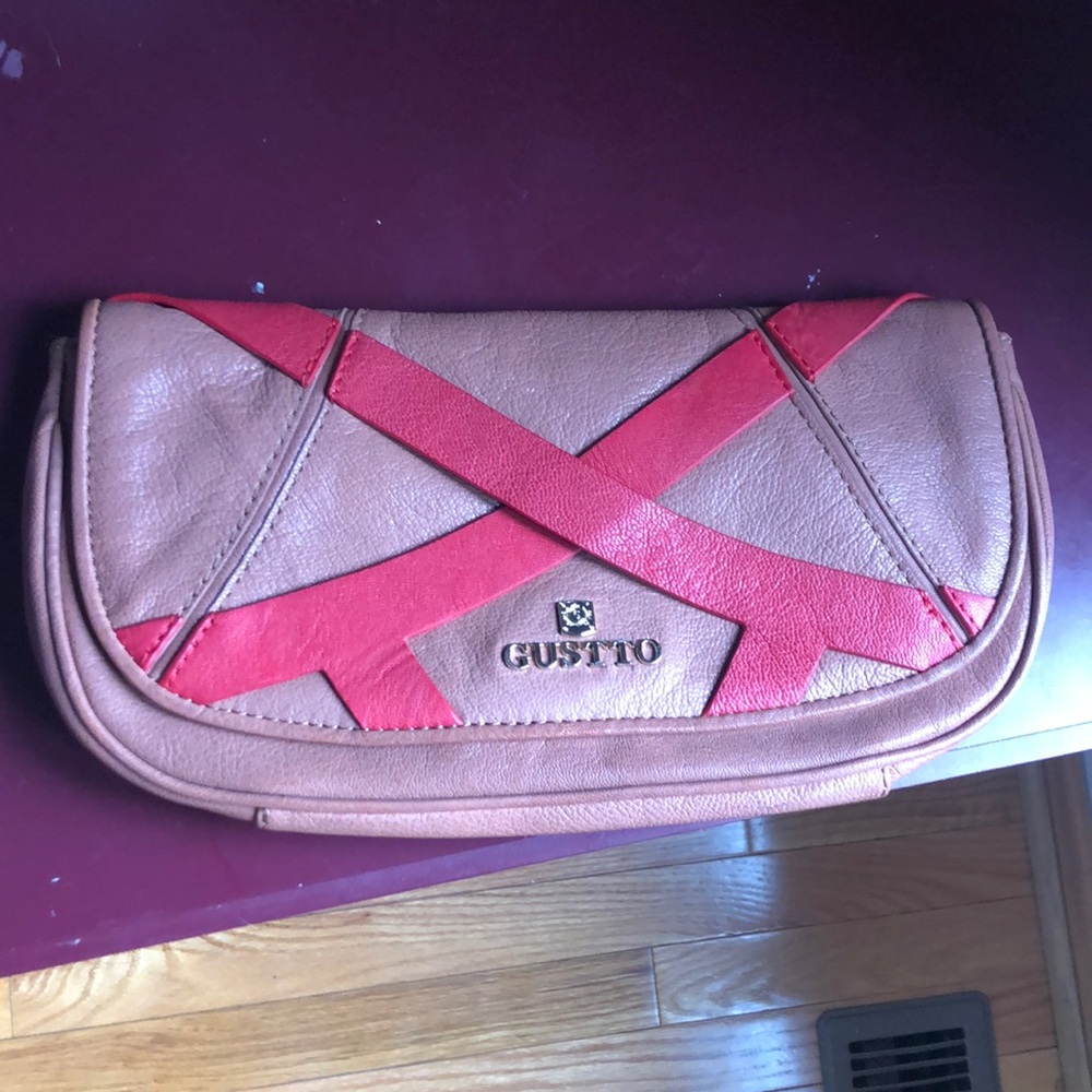 Tan and red Gustto clutch
